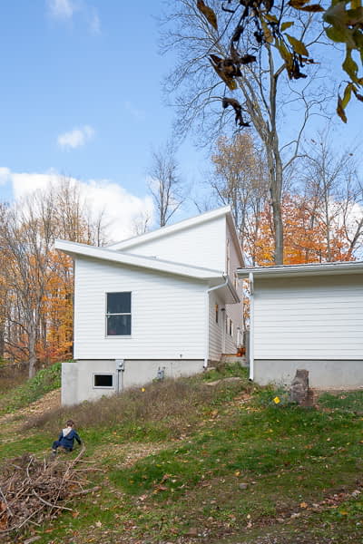 Bill Penner House Gambier, OH south facades with garage and pitched roofs